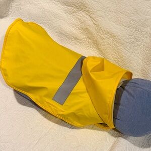 Yellow rain jacket with reflective strip and hood